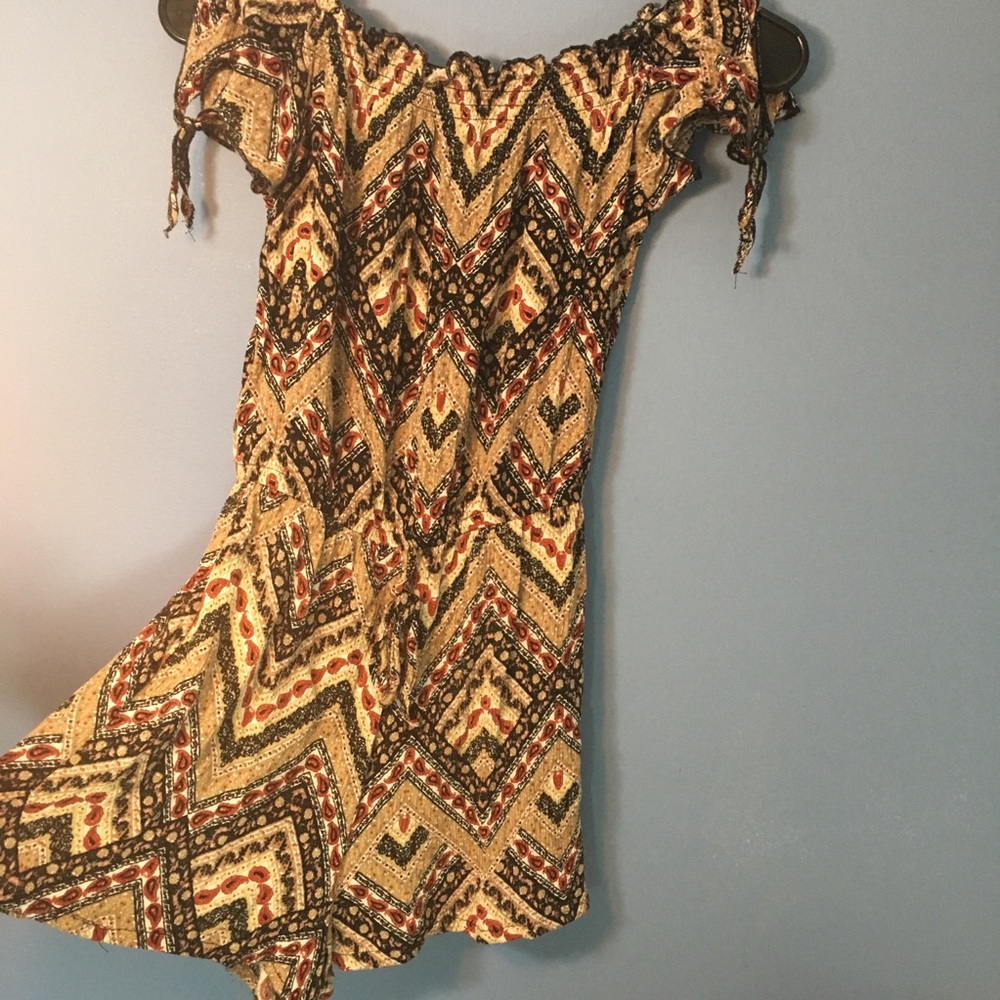 An off the shoulder romper